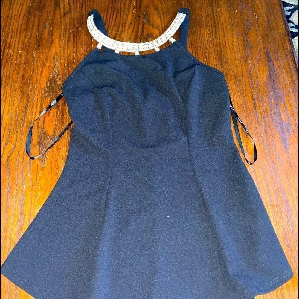 Woman’s papaya embellished sleeveless top